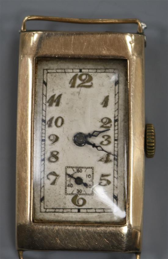 An early 20th century 9ct gold rectangular cased manual wind wrist watch, (no strap).